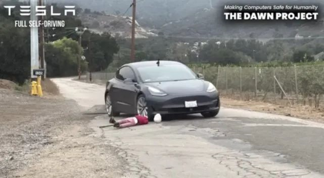 (Tesla hits a child dummy model)